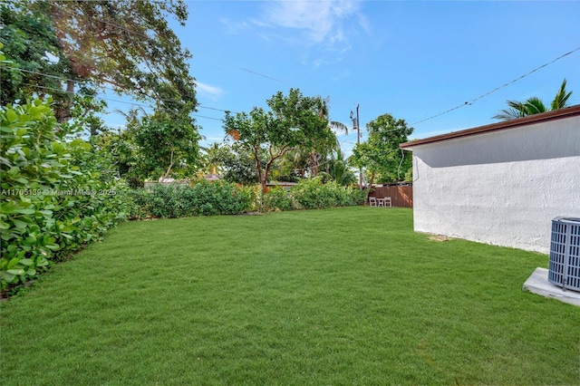 view of yard featuring central AC unit