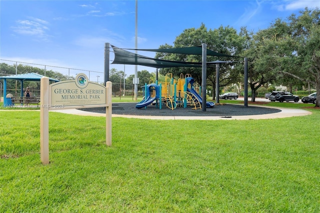 view of jungle gym with a lawn