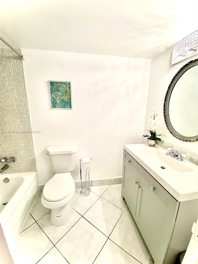 full bathroom with vanity, baseboards, tile patterned floors, toilet, and shower / bathtub combination