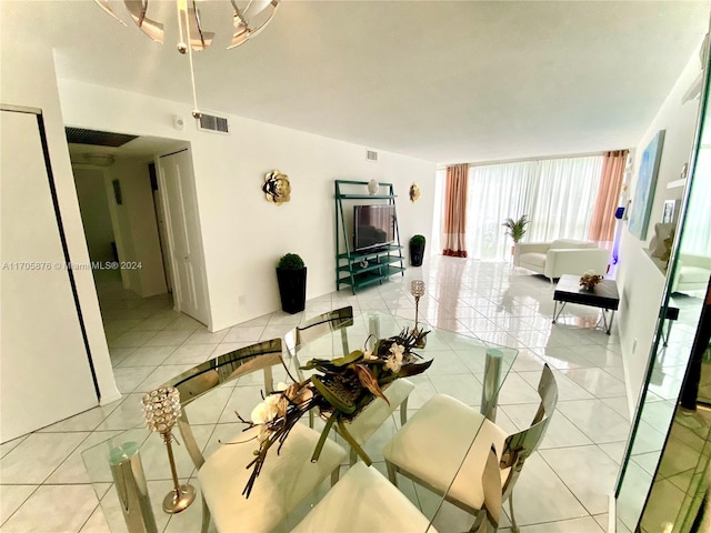 dining area with light tile patterned floors