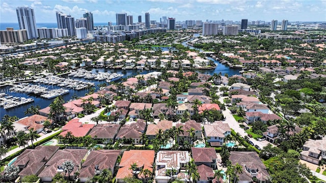 drone / aerial view with a water view and a city view