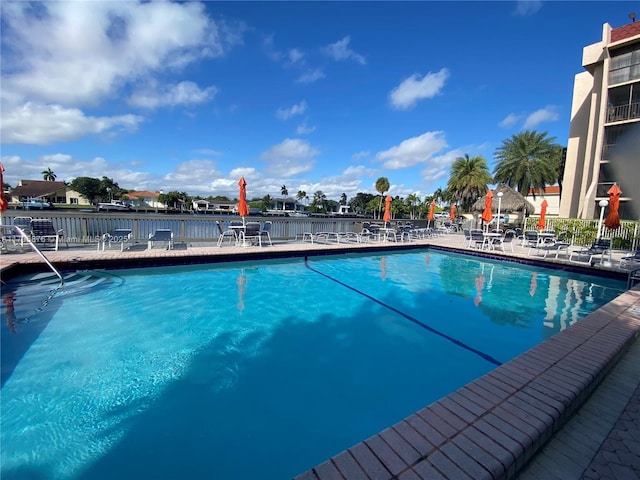 view of swimming pool featuring a patio area