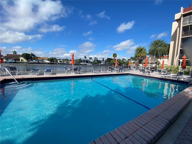 view of swimming pool with a patio area