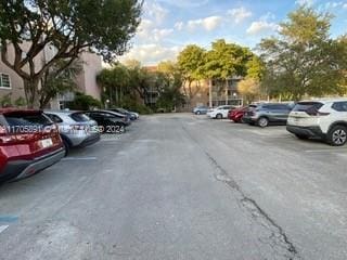 view of parking / parking lot