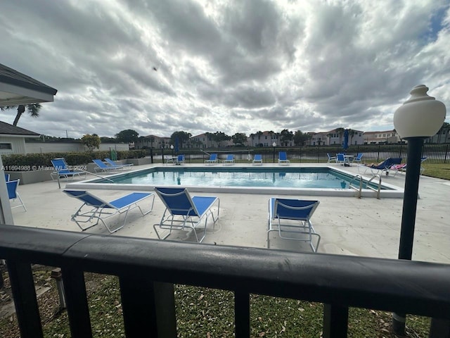 view of pool with a patio area