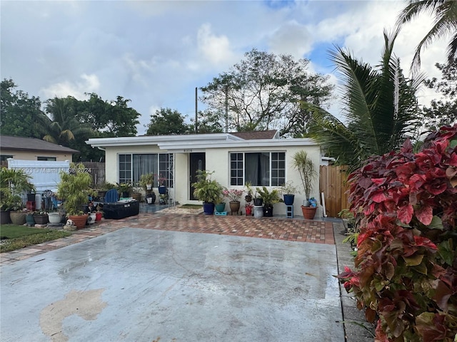 view of front of property with a patio