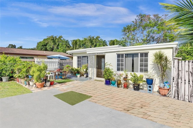 rear view of property with a patio area