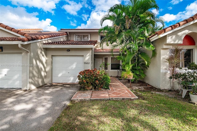 view of front of house with a garage