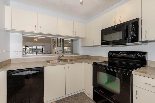 kitchen with sink, a textured ceiling, ceiling fan, and black appliances