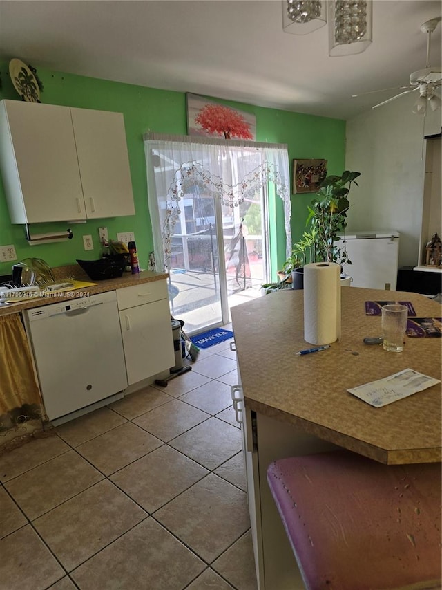 kitchen with dishwasher, light tile patterned flooring, and ceiling fan