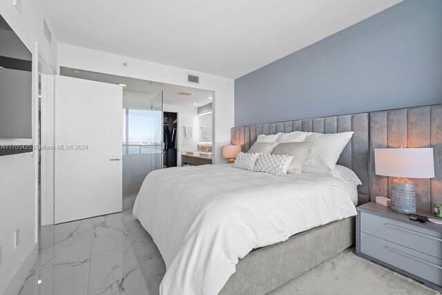 460 NE 28th St Unit 3205, Miami, FL 33137 - bedroom featuring light marble finish flooring, a closet, and a spacious closet