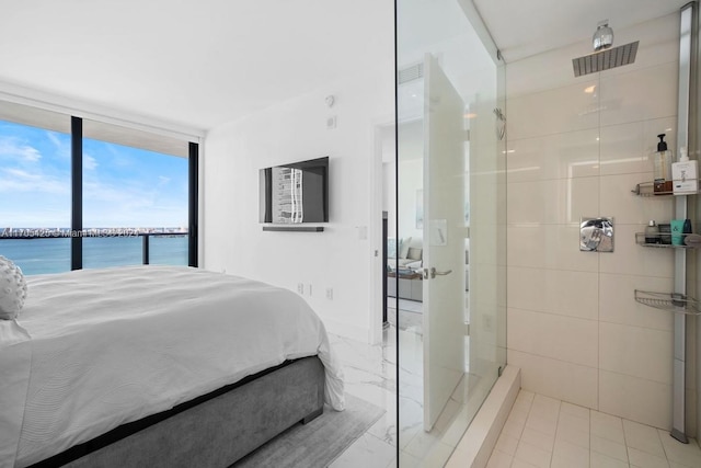 460 NE 28th St Unit 3205, Miami, FL 33137 - bedroom featuring floor to ceiling windows and a water view
