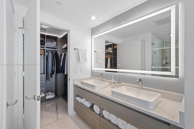 460 NE 28th St Unit 3205, Miami, FL 33137 - full bath with double vanity, a walk in closet, a stall shower, and marble finish floors