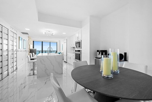 460 NE 28th St Unit 3205, Miami, FL 33137 - dining room with light marble finish floors