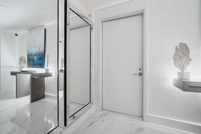 bathroom featuring a chandelier