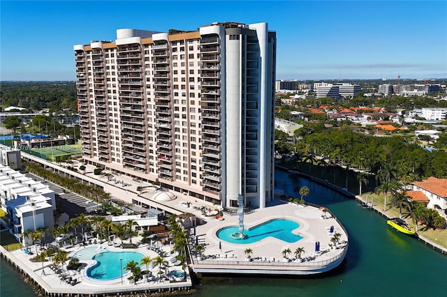 1800 NE 114th St Unit Ph05, Miami, FL 33181 - view of property featuring a community pool and a water view
