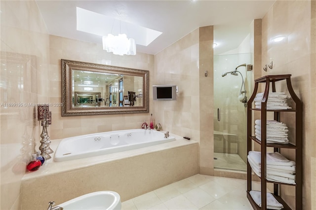 20155 NE 38th Ct Unit 2903, Aventura, FL 33180 - bathroom with a shower stall, tile patterned floors, a garden tub, a skylight, and a chandelier
