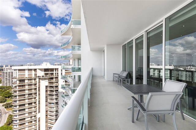 balcony featuring a city view