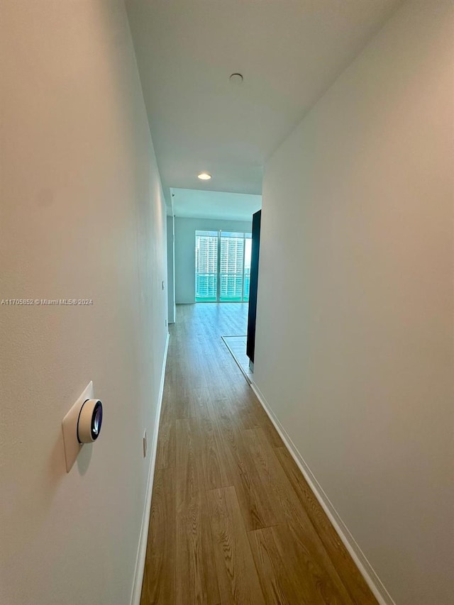 hallway featuring light hardwood / wood-style flooring