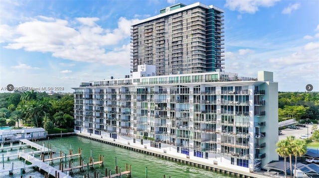 view of property with a water view