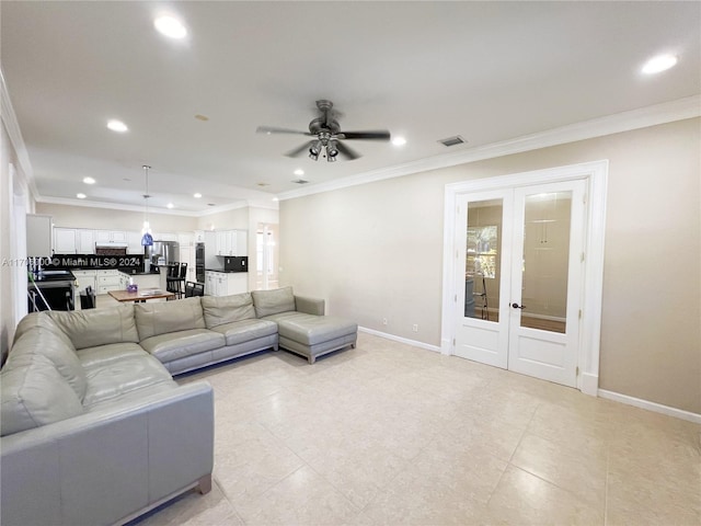 living room with french doors, ceiling fan, and crown molding