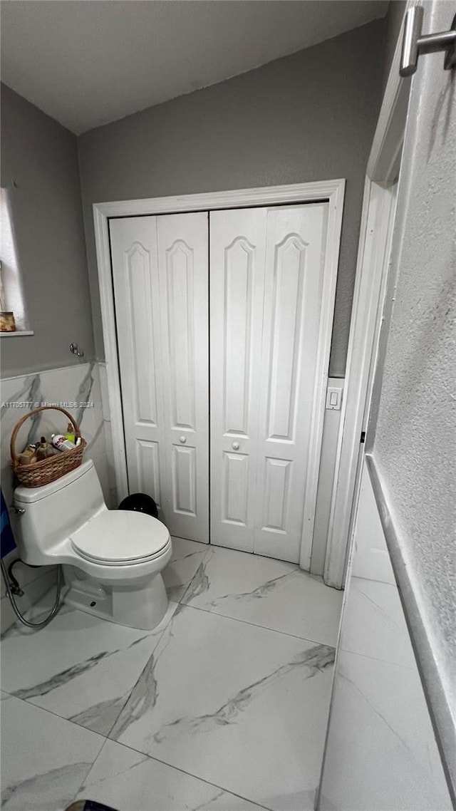 bathroom featuring toilet