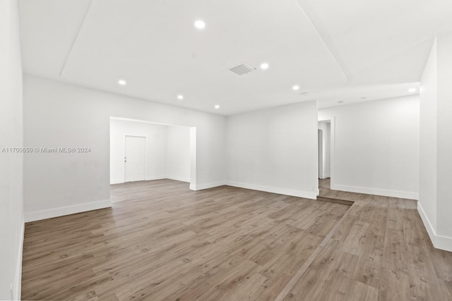 spare room with light hardwood / wood-style floors