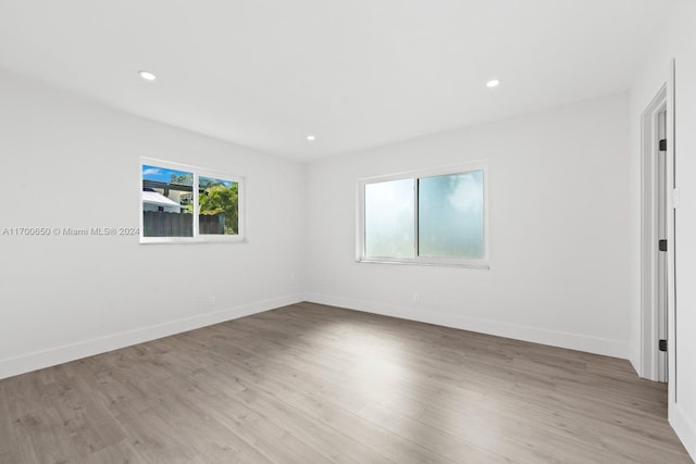 empty room featuring light hardwood / wood-style floors