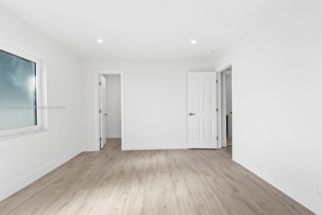 empty room featuring light hardwood / wood-style floors