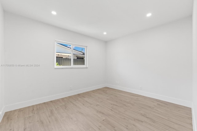 unfurnished room featuring light wood-type flooring