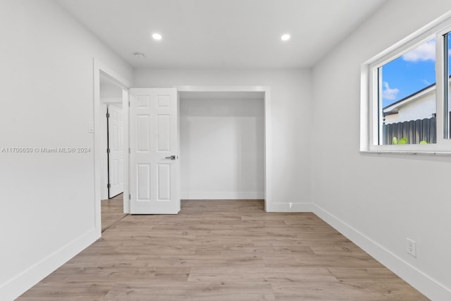 unfurnished bedroom with light hardwood / wood-style floors