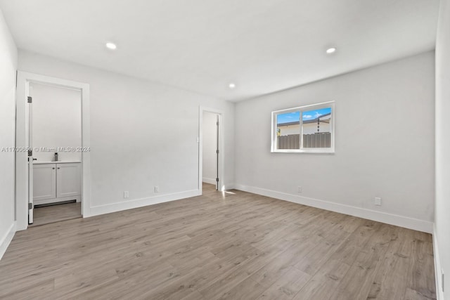 empty room with light wood-type flooring