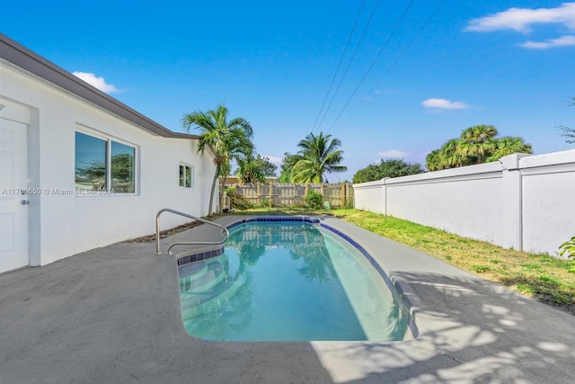 view of pool with a patio