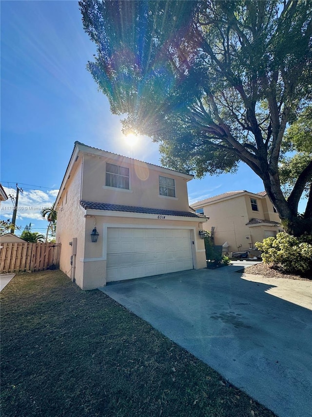 view of property featuring a garage