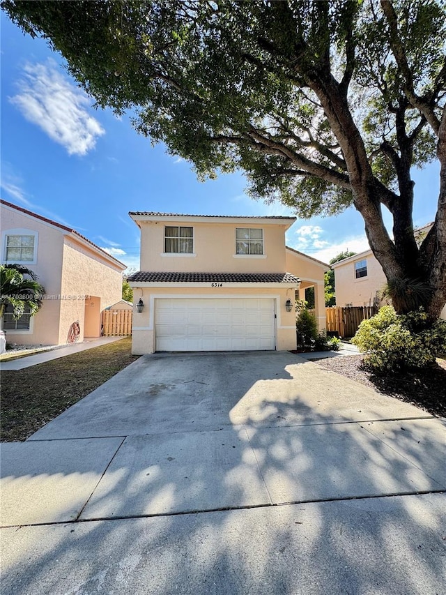 view of front of property with a garage