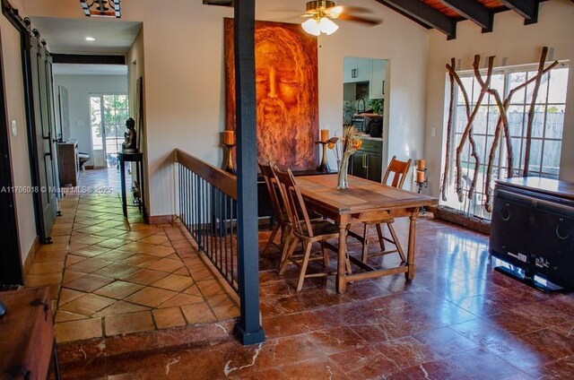 dining space featuring vaulted ceiling with beams, wood ceiling, and ceiling fan