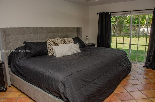 bedroom with light tile patterned floors