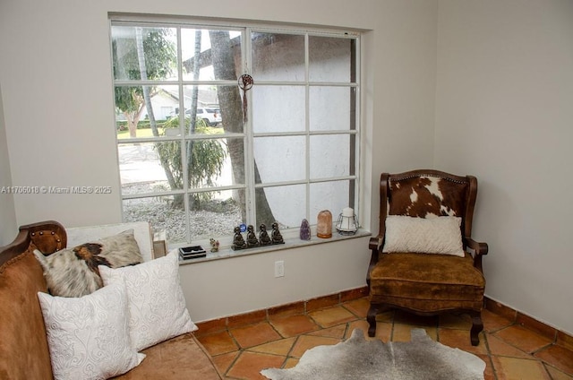 sitting room featuring light tile patterned floors