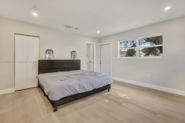 bedroom featuring light wood-type flooring