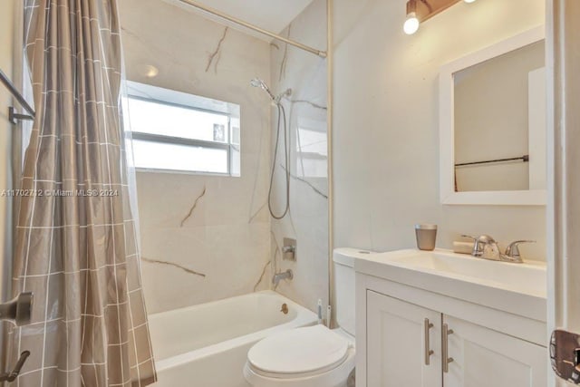 full bathroom featuring vanity, toilet, and shower / bathtub combination with curtain