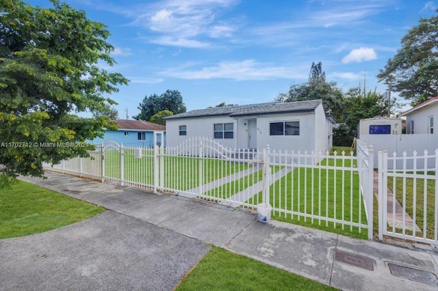 view of front of home with a front yard