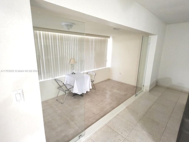 bathroom with tile patterned flooring