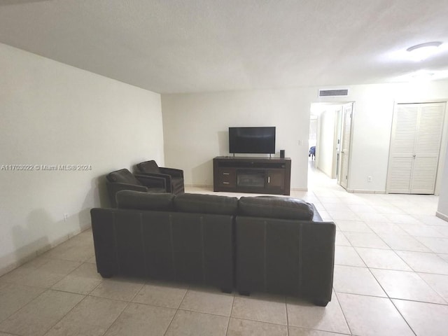 living room featuring light tile patterned floors