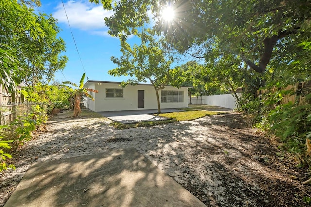 back of house with a patio area