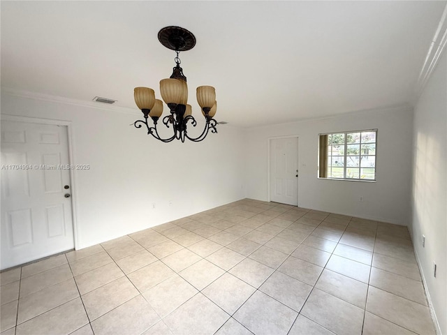 unfurnished room with a notable chandelier, light tile patterned floors, and crown molding