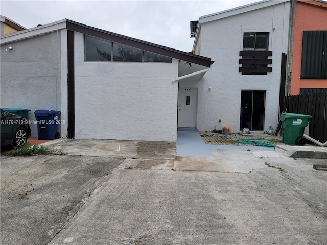 view of front of house featuring stucco siding