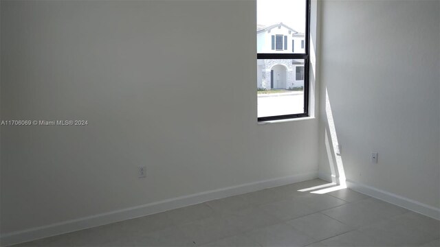 13313 SW 286th Ter Unit 13313, Homestead, FL 33033 - tiled empty room with baseboards