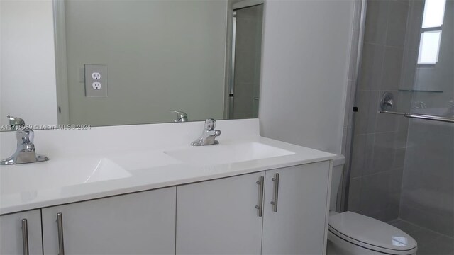 13313 SW 286th Ter Unit 13313, Homestead, FL 33033 - bathroom featuring double vanity and a stall shower