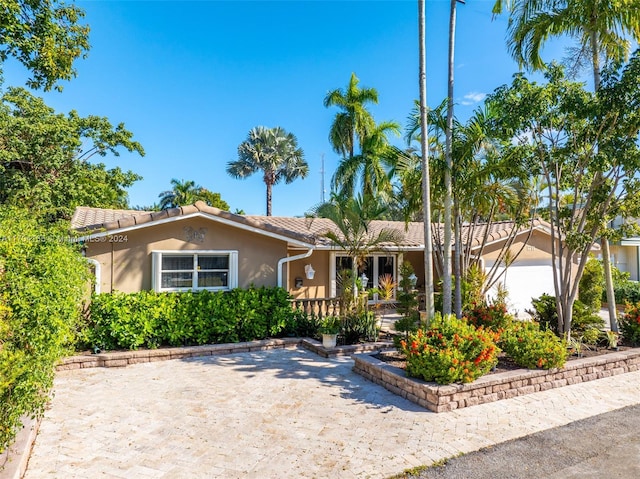 ranch-style house with a garage