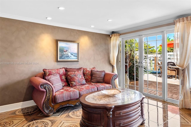 tiled living room with ornamental molding and french doors